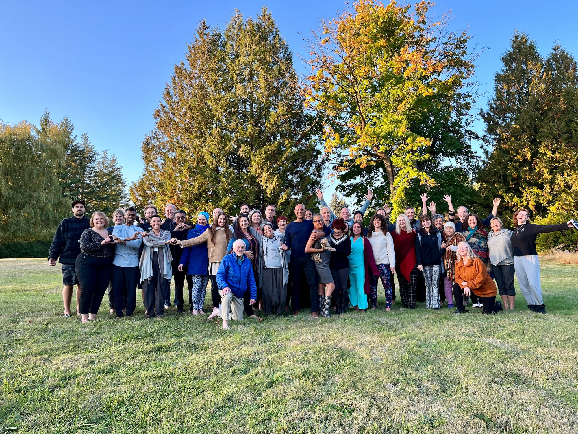 Coherence Institute practitioners gathered outdoors at a certification event